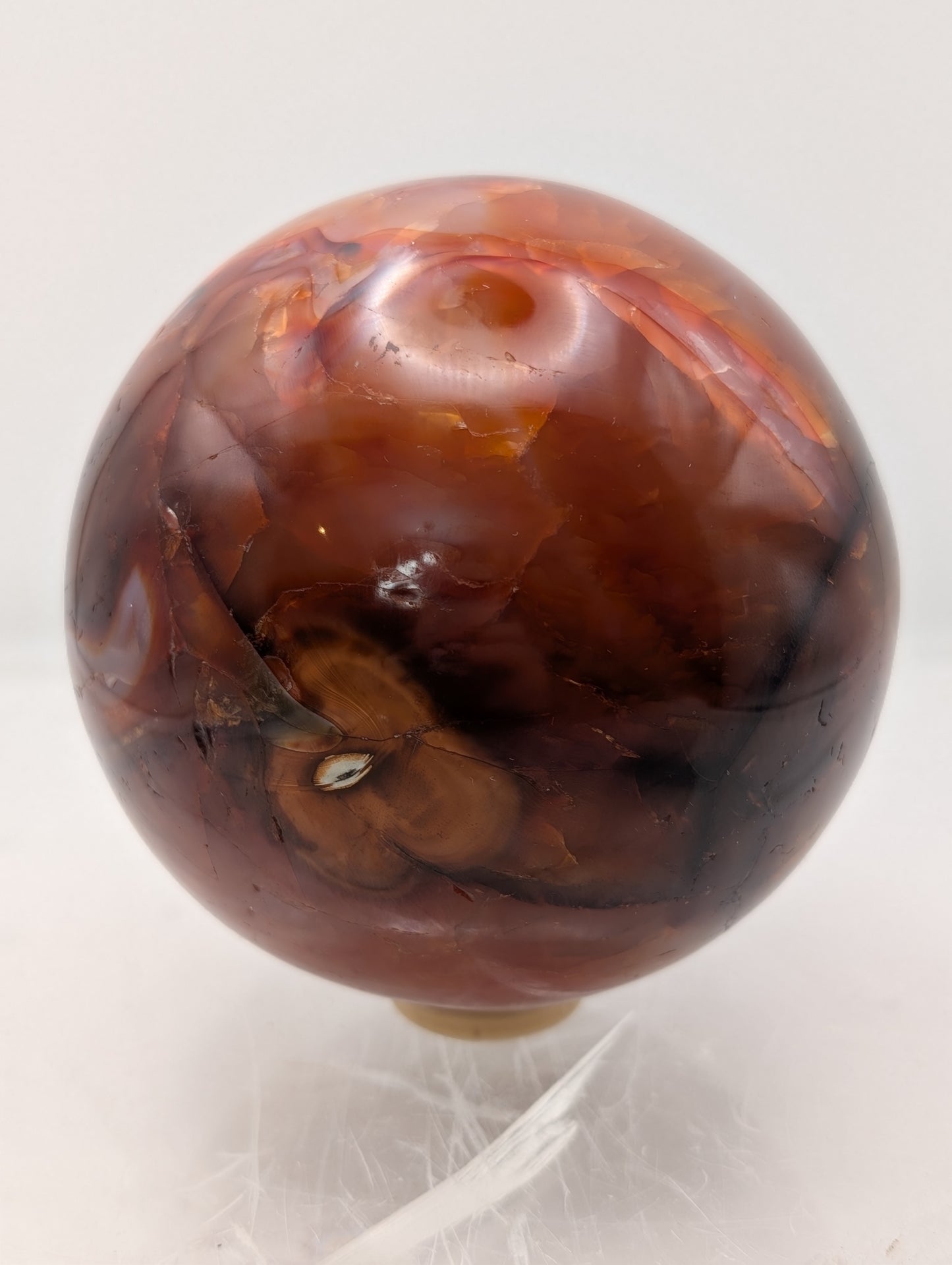 Large Carnelian Crystal Sphere with Wooden Ring Stand