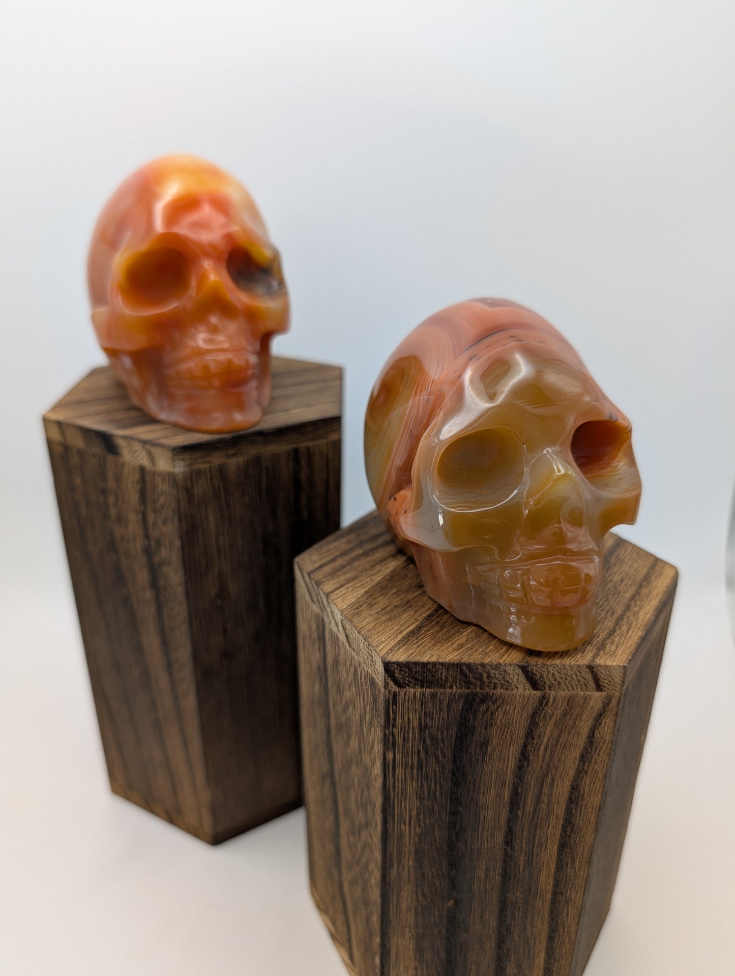 Carnelian Crystal Skulls in deep reds/oranges.