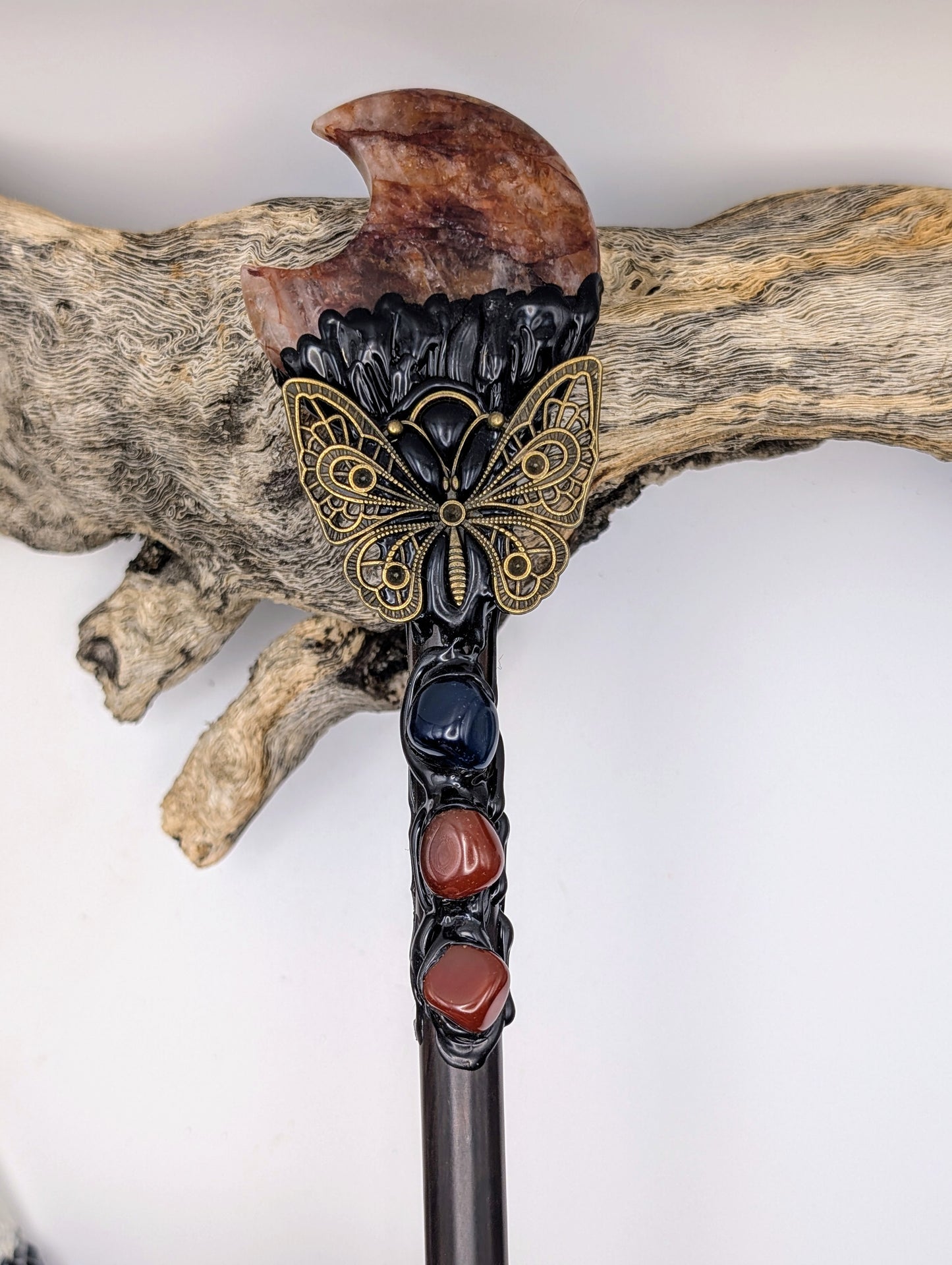 Fire Quartz Moon Crystal Magick Wand adorned with crystal tumble stones, black obsidian stone and a bronze butterfly
