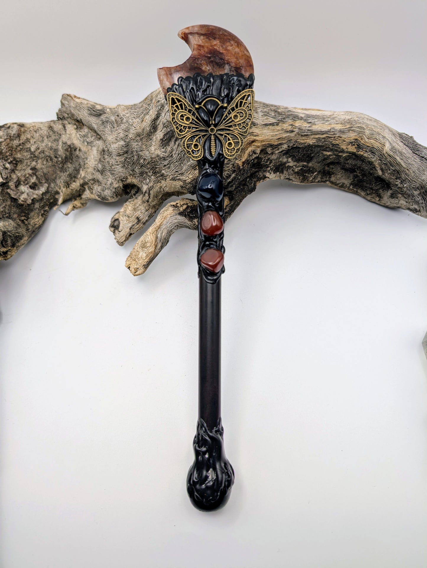Fire Quartz Moon Crystal Magick Wand adorned with crystal tumble stones, black obsidian stone and a bronze butterfly