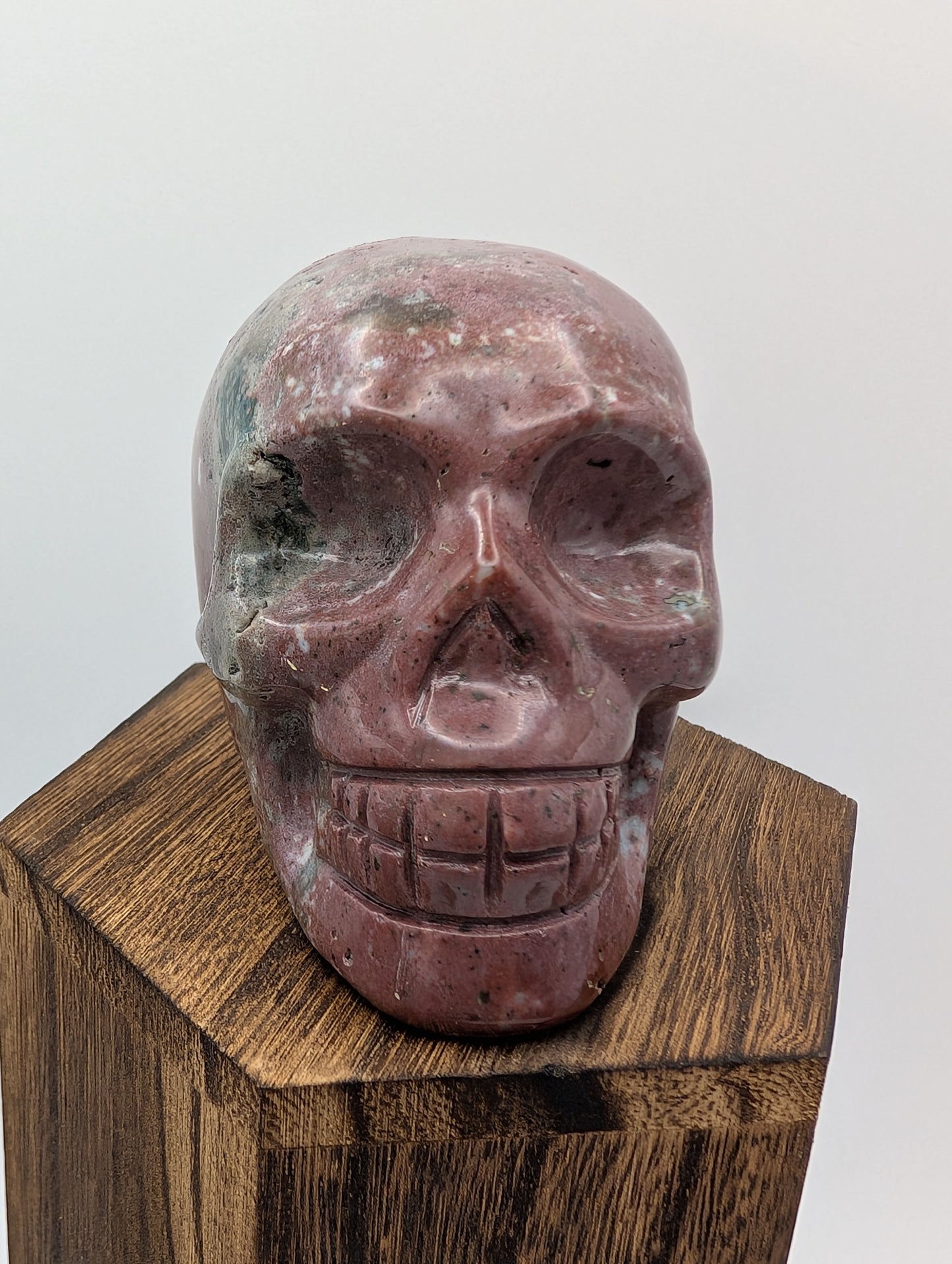 Rhodonite Crystal Skull Carving