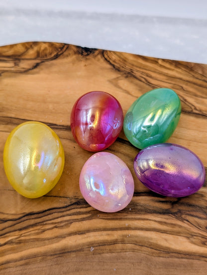 Large polished Aura Quartz tumbles with vibrant iridescent rainbow finishes