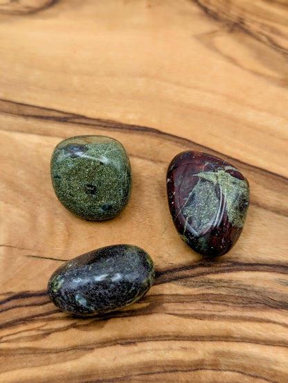 Polished Dragon Blood Jasper tumbles with natural green red and burgundy markings