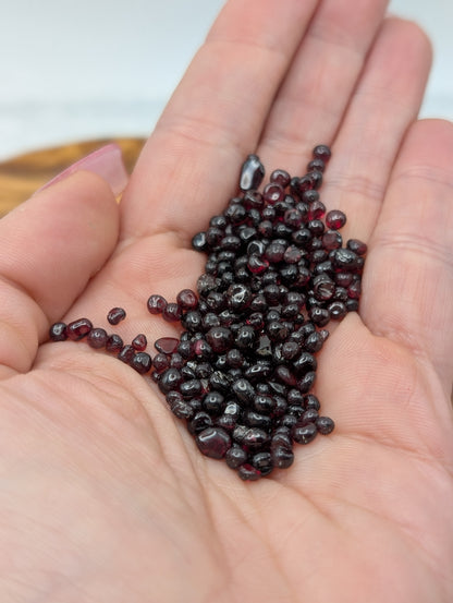 Polished Garnet chips with glossy deep red and burgundy coloring