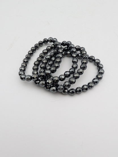 Hematite beaded stretch bracelet with reflective faceted round beads