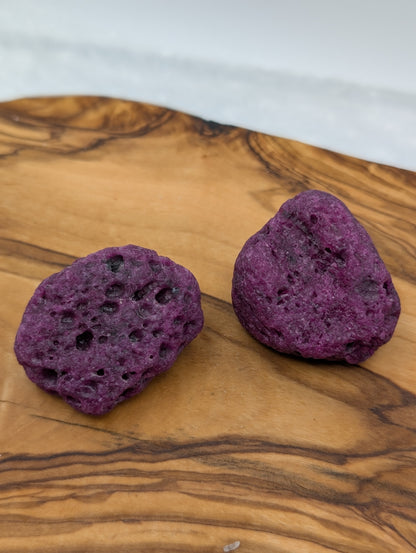 Honeycomb Ruby rough stones with porous raspberry pink and purple-red texture