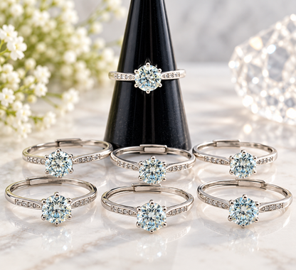 Mozambique Diamond sterling silver adjustable rings with round faceted stones displayed in boutique setting