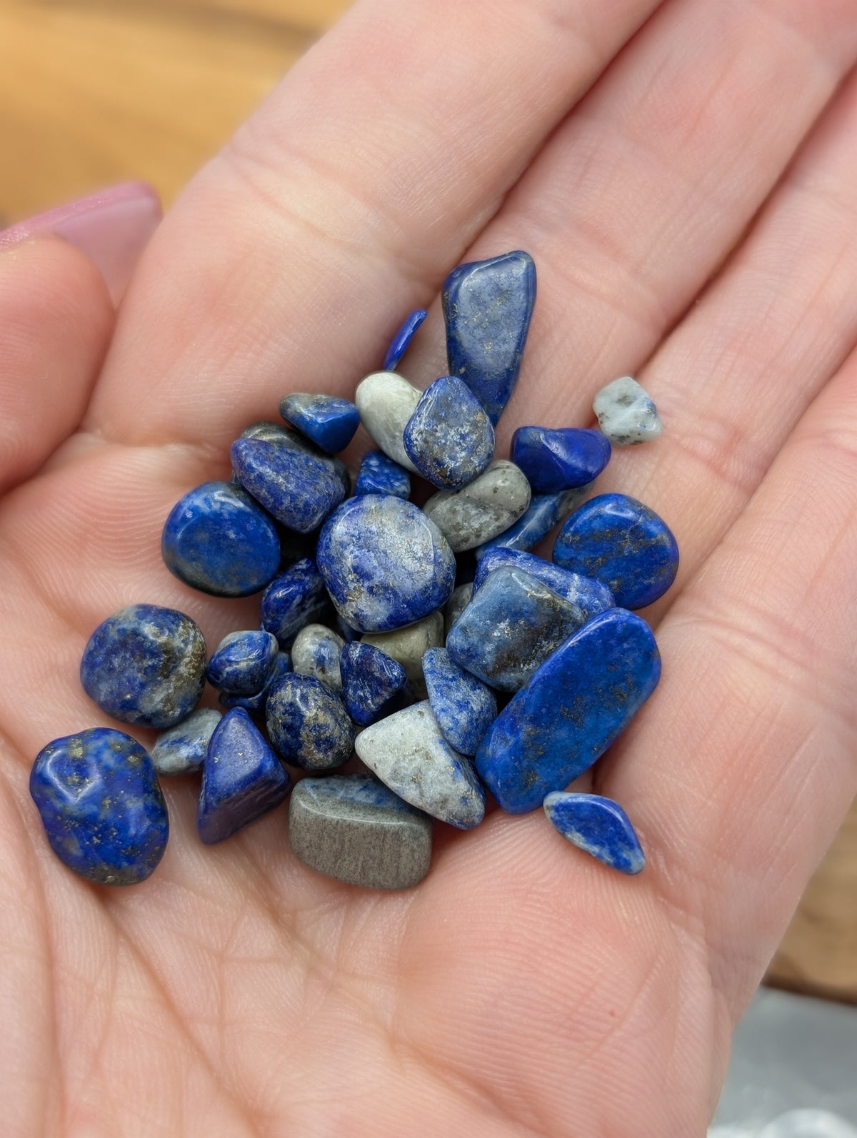 Polished Lapis Lazuli crystal chips with royal blue, white and golden mineral variations