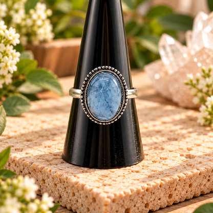 Oval Aquamarine sterling silver adjustable ring with blue cabochon and beaded setting
