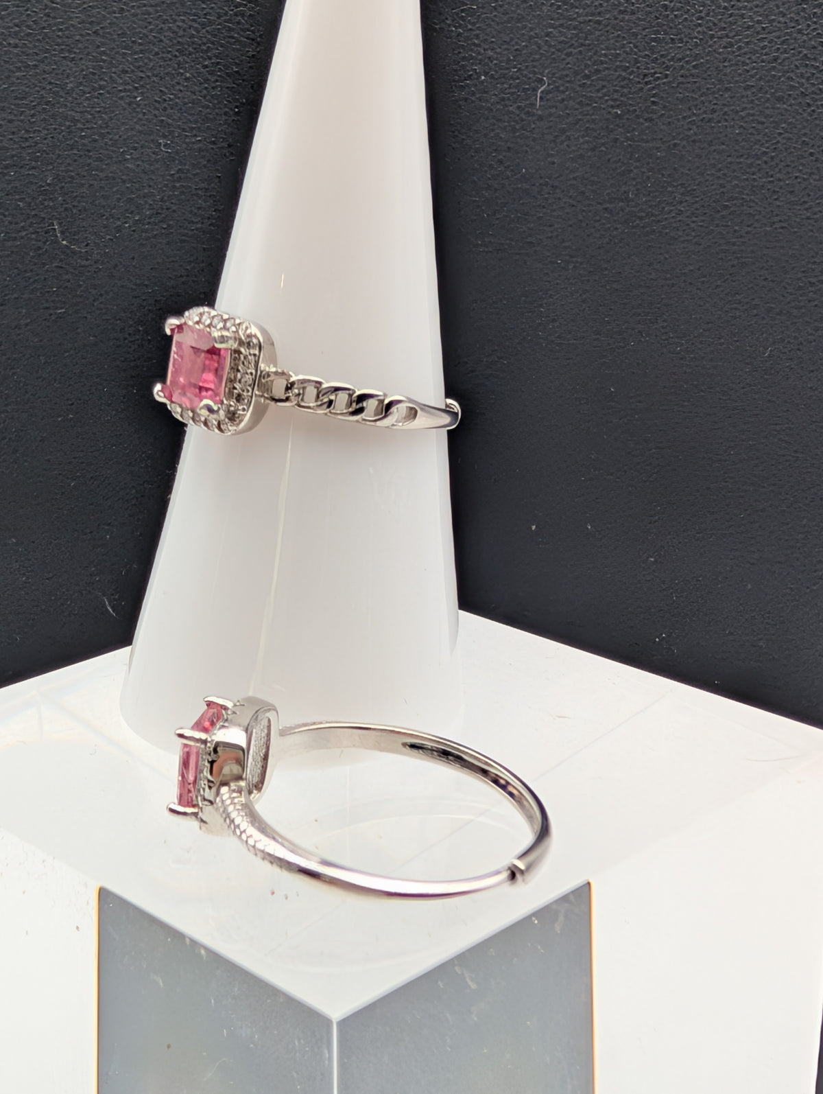 Side view of Pink Tourmaline 925 sterling silver adjustable rings showing chain-link and textured bands