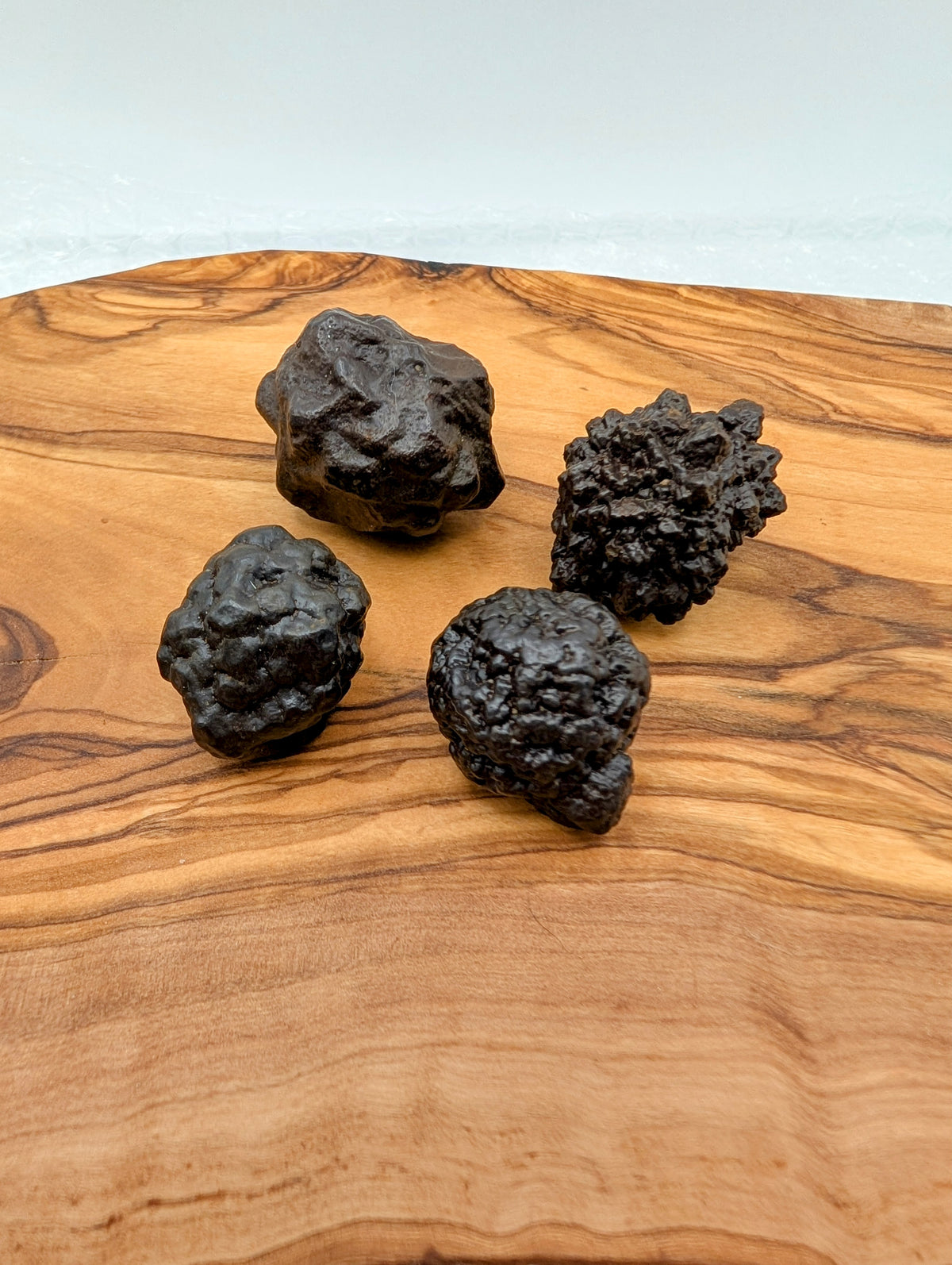 Raw Prophecy Stones with dark brown knobby textured natural mineral formations