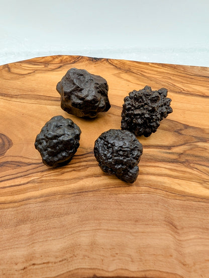 Raw Prophecy Stones with dark brown knobby textured natural mineral formations