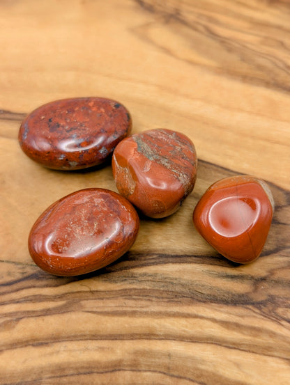 Polished Red Jasper tumble stones in natural brick red rust and earthy tones