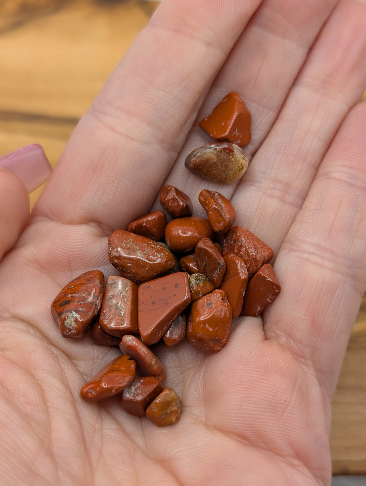 Polished Red Jasper tumble stones in natural brick red rust and earthy tones