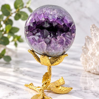Close-up of 68mm Amethyst open smile geode sphere showing natural purple crystal points and druzy cavity