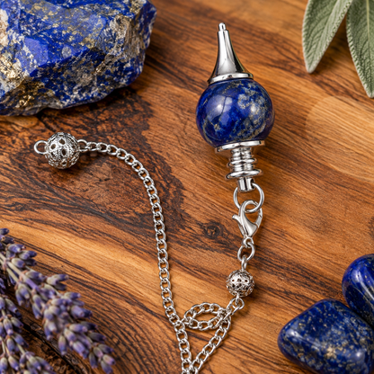 Lapis Lazuli crystal pendulum with polished deep blue stone and ornate silver metal chain
